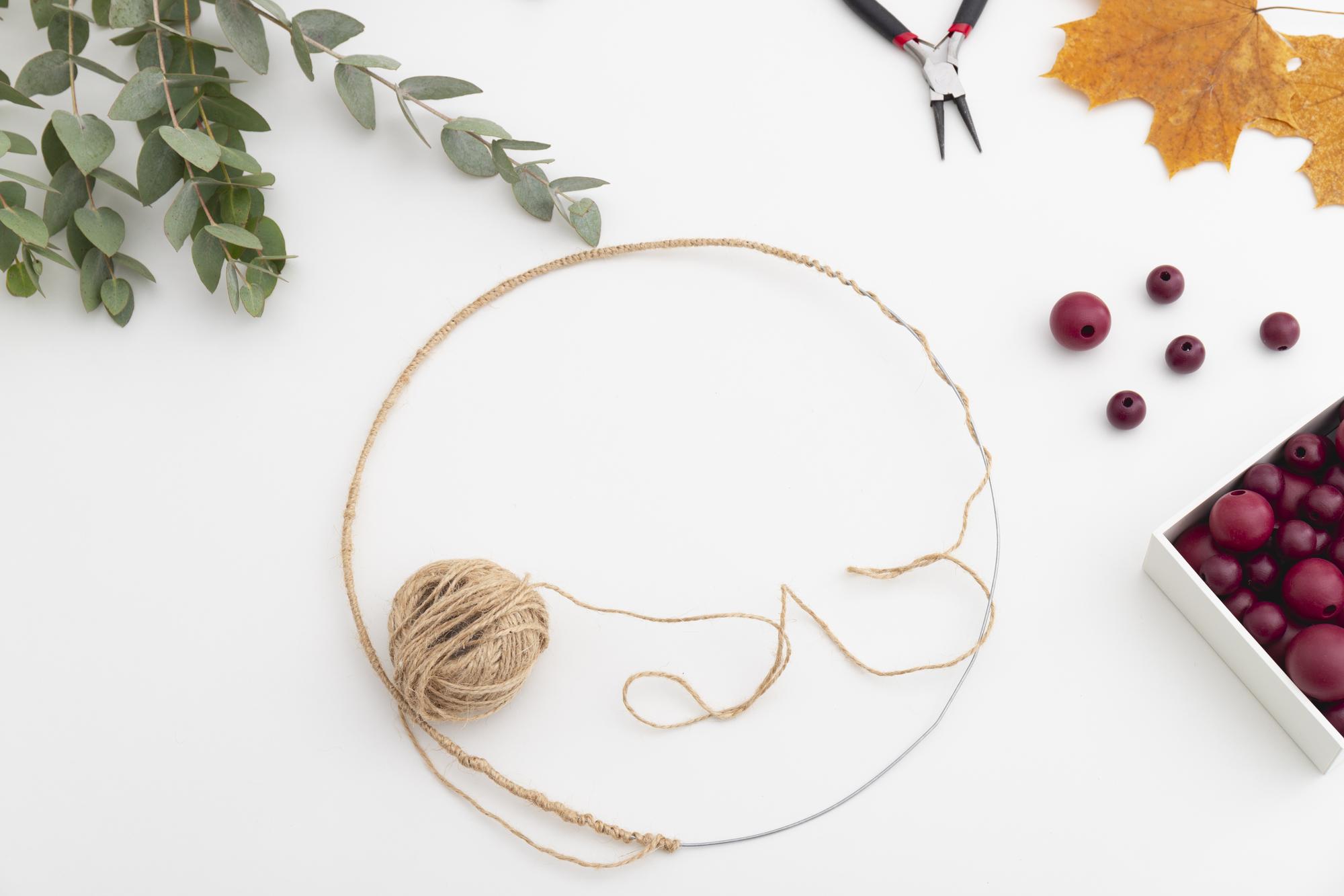 studio desk with threads and hoop