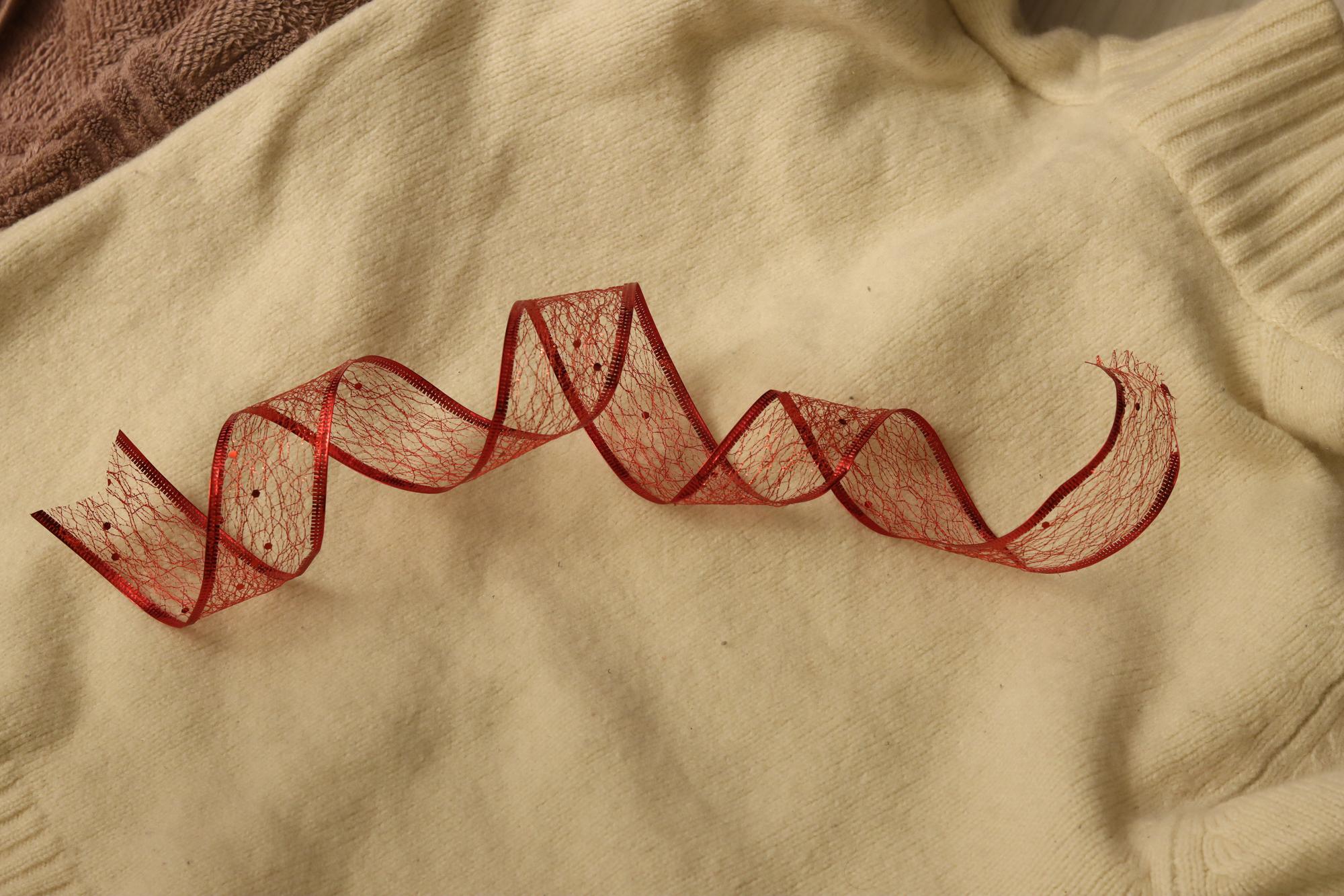close-up of hand embroidery on natural linen